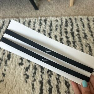 Two Never Worn Nike Swoosh Sport Headbands